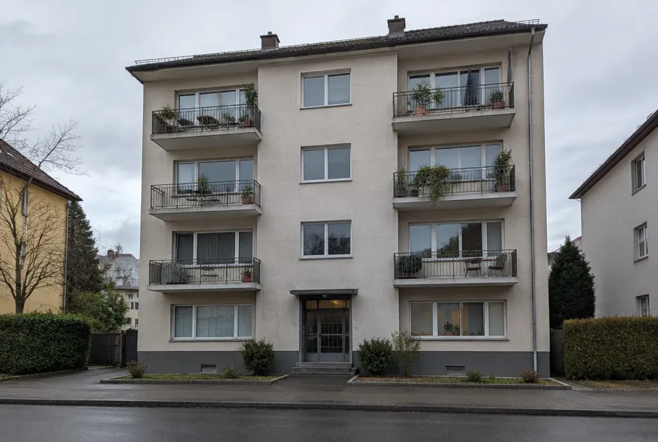 A small apartment building with balconies